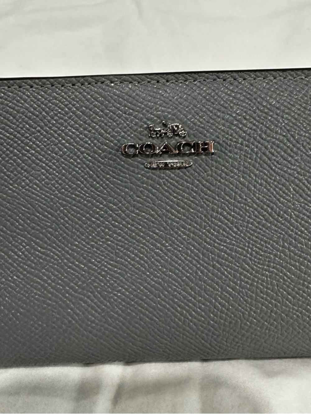Coach Pebbled Gray Leather wallet with silver tone hardware.